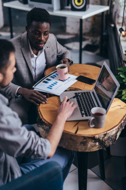 istock Business men over coffee talk about work 1419534696