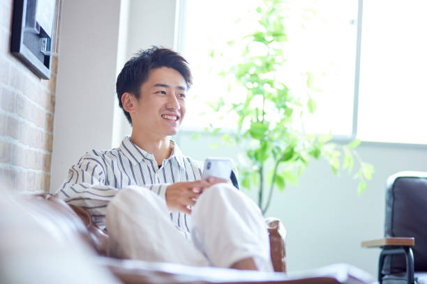 Japanese man relaxing in his room