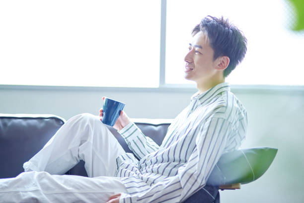Japanese man relaxing in his room