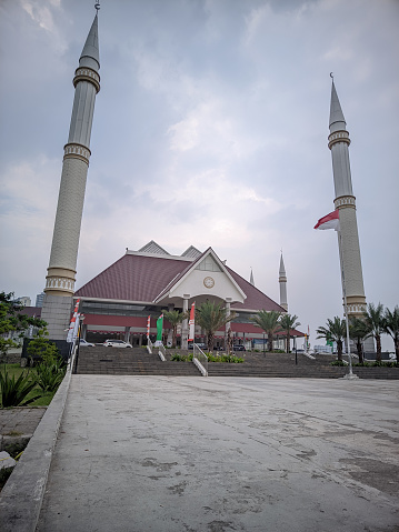 a mosque was built very majestically standing near the highway on the outskirts of the city