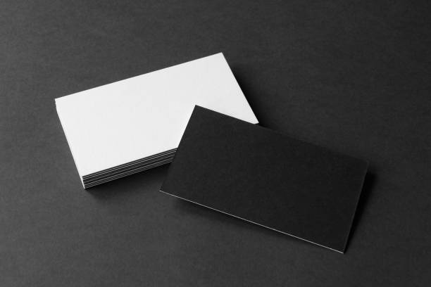 istock Business card on black background. 1419549000