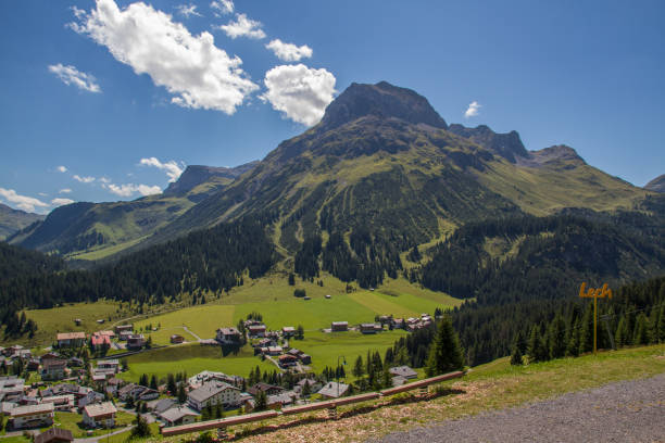View of austrian village Lech am Arlberg at the European Alps with mountain Omeshorn, during summer