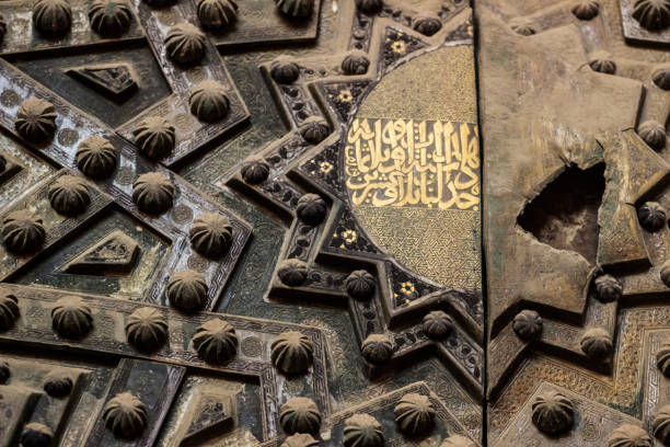 istock Bronze ornaments islamic pattern at mosque at Sultan Hassan Mosque 1419551519