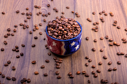 International Coffee Day concept. October 1st. Mug with American flag symbols