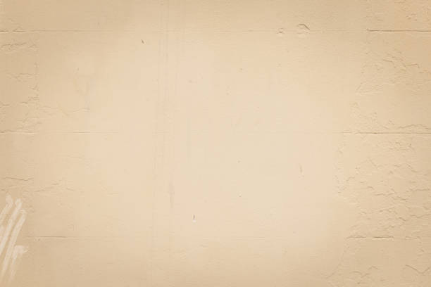 istock Part of a textured beige concrete wall 1419555784