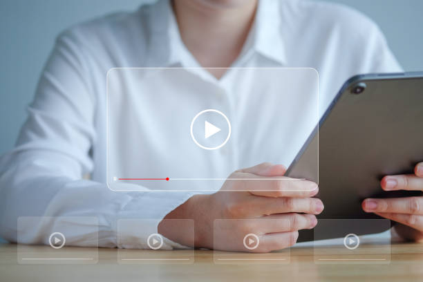 istock Video streaming on internet. Watching online movie, TV series, live concert, show or tutorial on tablet screen. Multimedia player. Subscription based live digital stream or channels. 1419556518