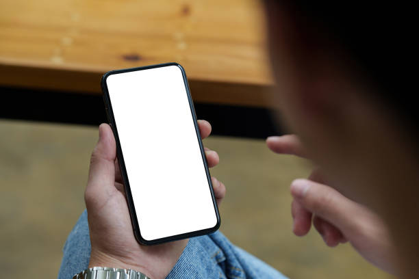 istock Asian Man hand holding smartphone empty screen. Technologt concept 1419557301
