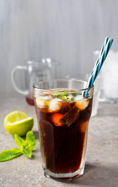 Cuba Libre or long island iced tea cocktail with strong drinks stock photo
