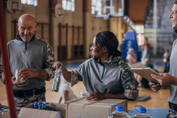 istock Soldiers preparing donations for civilians 1419559140