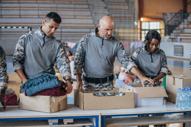 istock Soldiers preparing donations for civilians 1419559277