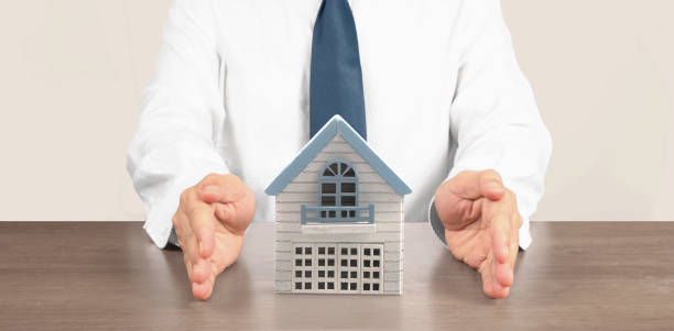 istock House Residential Structure in  hand 1419559844