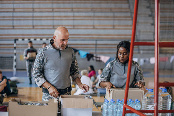 istock Soldiers preparing donations for civilians 1419559980