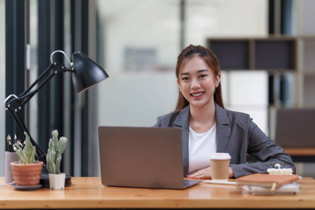 istock Modern business woman analysis financial paperwork document 1419561359