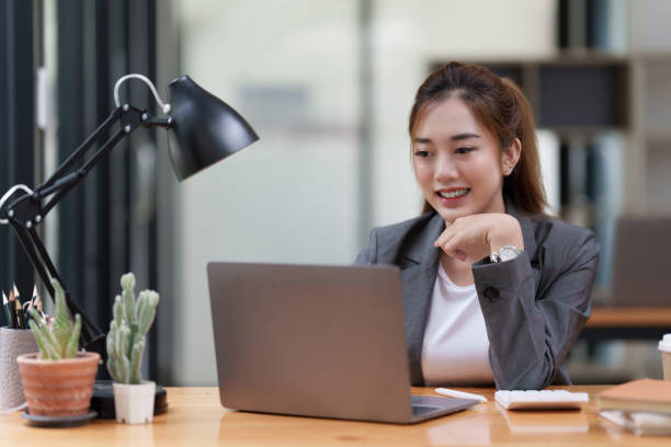 istock Modern business woman analysis financial paperwork document 1419561461
