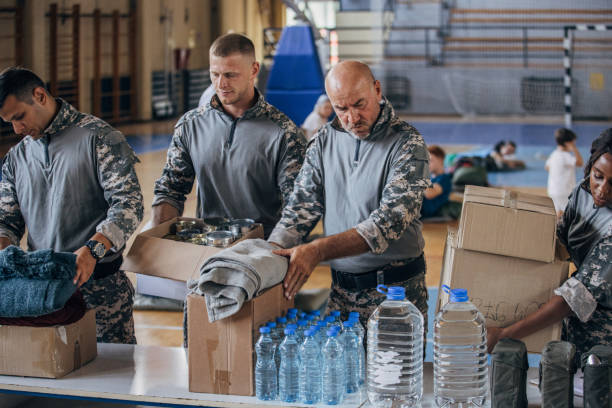 istock Soldiers preparing donations for civilians 1419562097