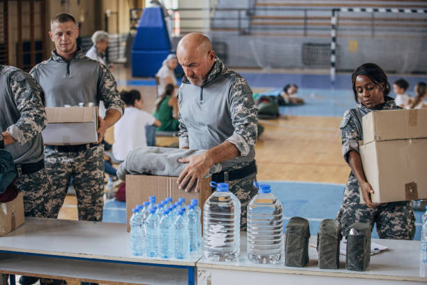 istock Soldiers preparing donations for civilians 1419562127
