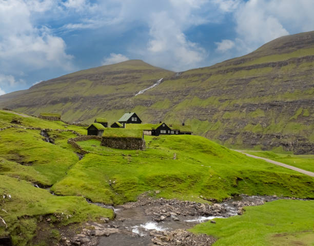 Surreally beautiful Saksun village on the northwest coast of Streymoy Island, Faroe Islands (Faroes, FÃ¸roya, FÃ¦rÃ¸erne) a North Atlantic archipelago part of the Kingdom of Denmark. Surreally beautiful Saksun village on the northwest coast of Streymoy Island, Faroe Islands (Faroes, FÃ¸roya, FÃ¦rÃ¸erne) a North Atlantic archipelago part of the Kingdom of Denmark. fã stock pictures, royalty-free photos & images