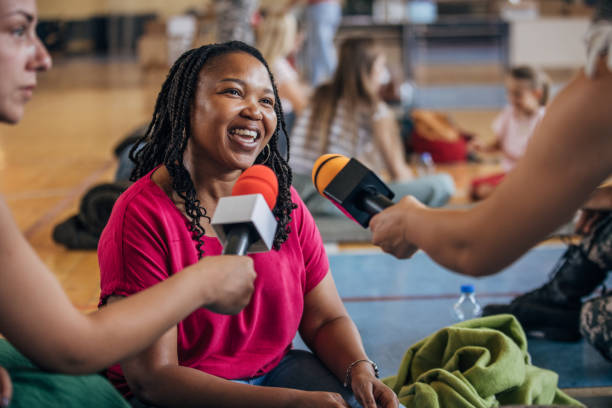 Press talking to civilians in shelter