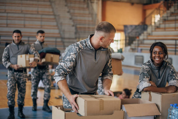 istock Soldiers preparing donations for civilians 1419569794
