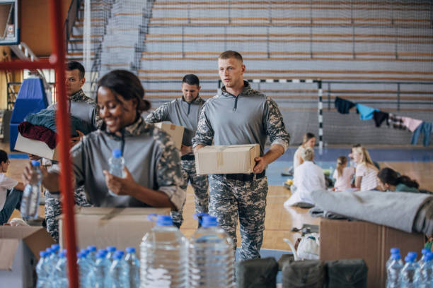 istock Soldiers preparing donations for civilians 1419569992