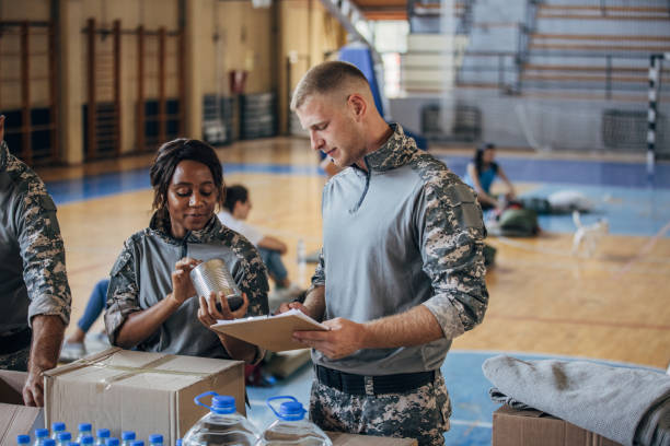 istock Soldiers preparing donations for civilians 1419570179