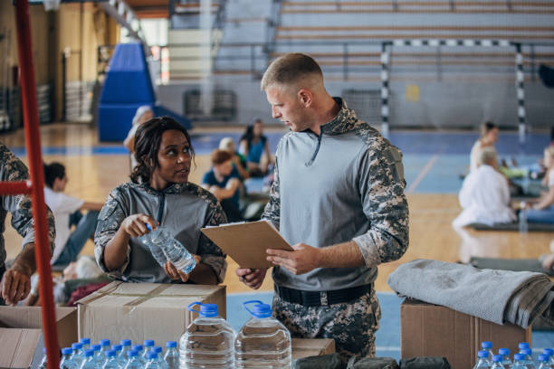 istock Soldiers preparing donations for civilians 1419570286