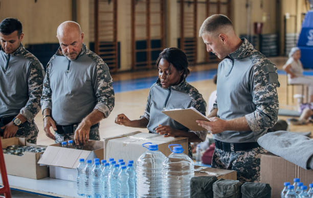 istock Soldiers preparing donations for civilians 1419570342