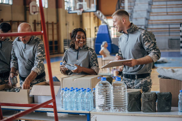 istock Soldiers preparing donations for civilians 1419570380