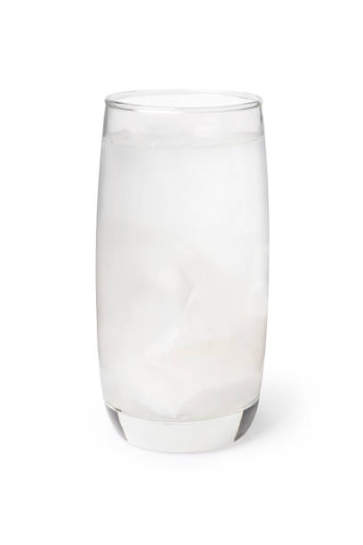 Glass of fresh coconut juice (coconut water) isolated on white background