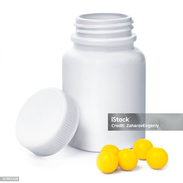 Aperto Il Contenitore Di Plastica Giallo Medica Con Vitamine - Fotografie stock e altre immagini di Accudire