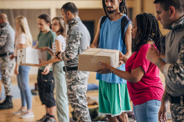 istock People working together after natural disaster 1419575895