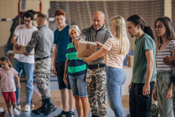 istock People working together after natural disaster 1419576065