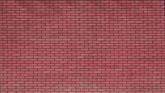 Textured background from red vintage brick wall outdoor. Brickwork building facade.