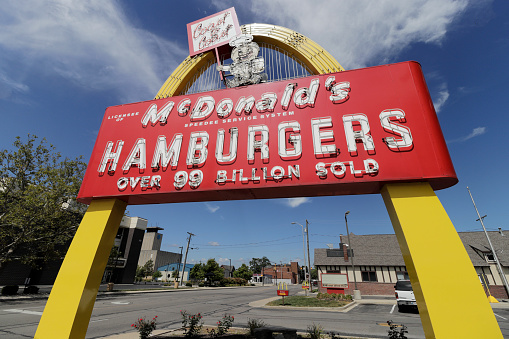 Muncie - Circa August 2022: McDonald's Restaurant. McDonald's is offering employees higher hourly wages, paid time off, and tuition payments.
