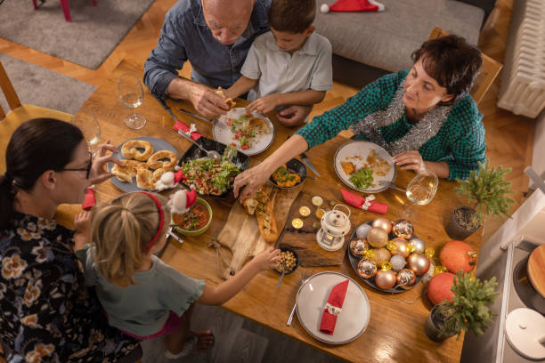 istock Family gathered for the Christmas dinner 1419584011