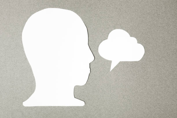 istock paper face and speech bubble on colorbackground copy space for text, communication, symbolic 1419584270