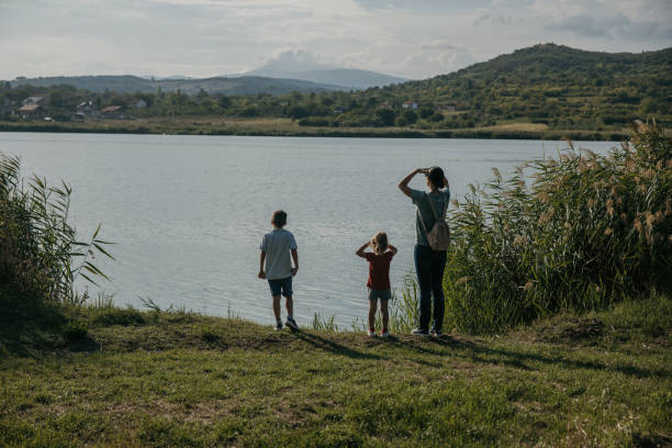 istock Family overlooking the lake 1419584712