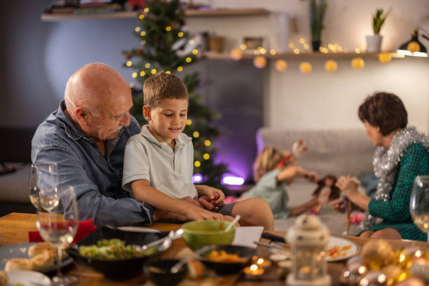 istock Enjoying Christmas with grandparents 1419585238