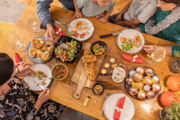 istock Family gathered for the Christmas dinner 1419586454