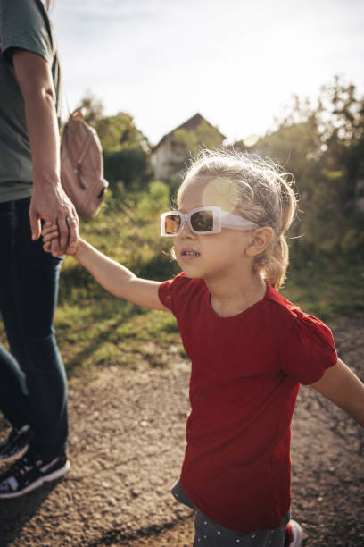 istock Mother and little daughter exploring summer nature 1419586562