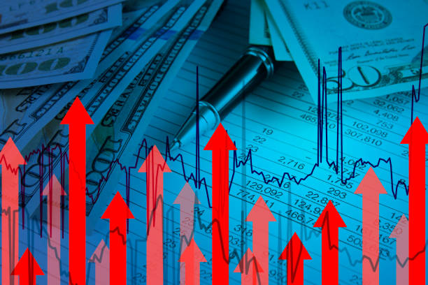 Inflation concept with one hundred American dollar bill with red finance graph and moving up arrows