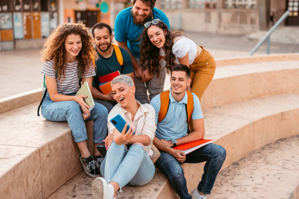 istock Group Of Students Taking A Selfie On The University Campus 1419602549