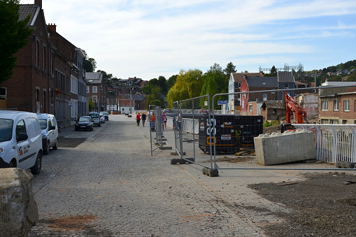 Pepinster, Province of Liège, Belgium - August, 30, 2022: quay Ferdinand Nicolaï. Reinforcing the quay works, year after historical flood  river La Vesdre