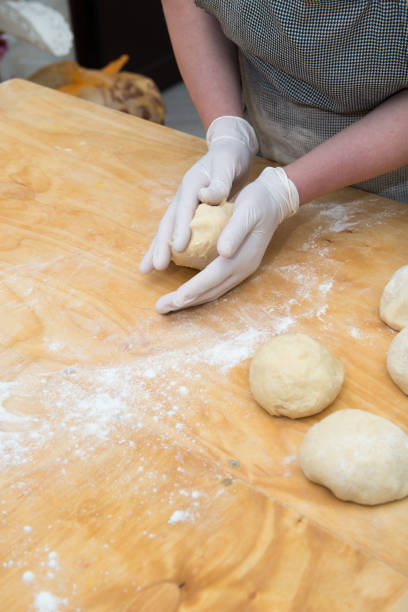 istock Confectioner chef coocking for baking sweets  and pizza hands working moment 1419604609