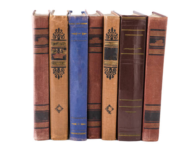istock Stack of old books. Library shelf. The book is in a cloth cover. Vintage binding. 1419605914