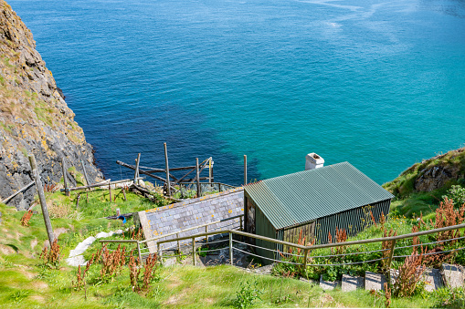 Abandoned fishing hut on the cliffs at Carrick-a-Rede