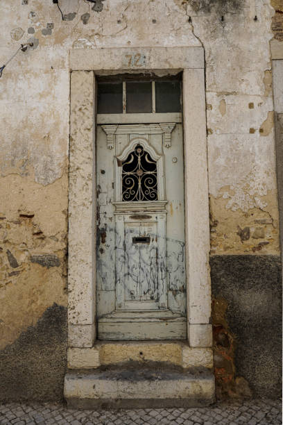 istock Old wooden door in ancient building 1419609981