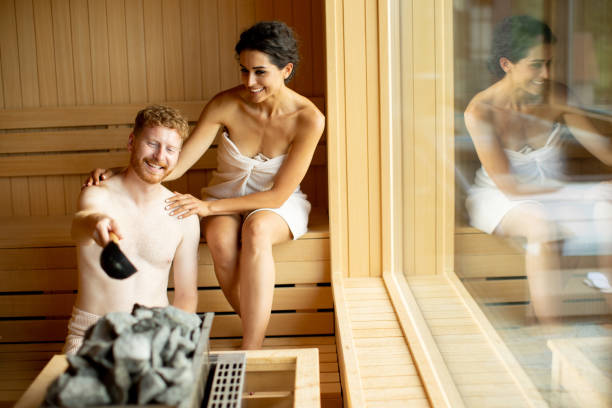 istock Young couple relaxing in the sauna 1419611437