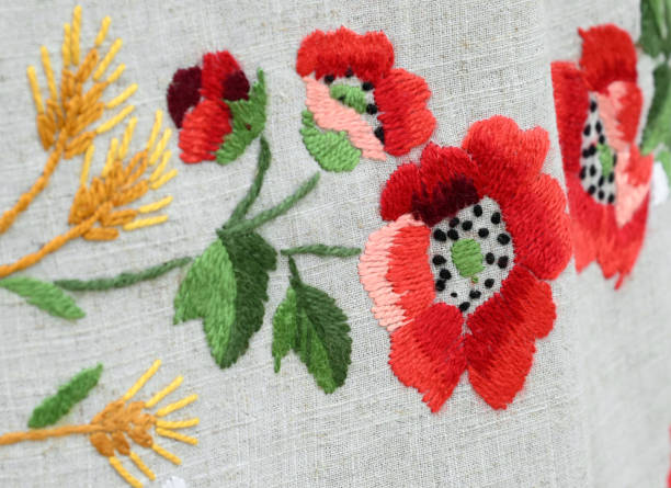 istock Flower embroidery on linen fabric 1419613565