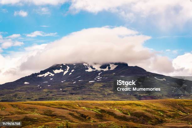 Natural Pileus Cloud Covered On Volcanic Mountainin Icelandic Highlands On Daylight At Thorsmork Iceland Stock Photo - Download Image Now